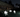 A fleet of illuminated Boat Lamps floating peacefully in a garden pond, creating a magical, multi-colored ambient outdoor lighting display.