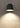 Weather-resistant LED outdoor wall sconce, IP65 rated, black finish, compact design by Visual Comfort