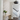 Spun metal shade of the Brummel 20-inch pendant light, reflecting a soft, ambient light - foyer lighting.