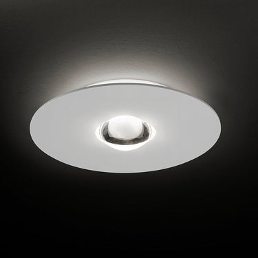 Bugia Single LED ceiling light by Lodes with soft up and down glow in modern minimalist interior