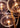 Lyndon pendant light by Oluce in satin gold finish, closeup studio shot