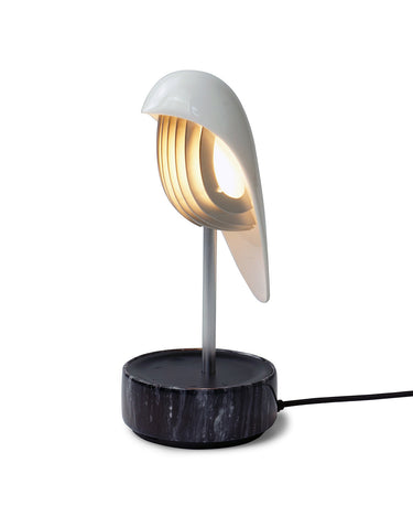 Chirp by Daqiconcept, porcelain bird above black marble