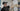 CTO Lighting team member hanging handmade glass discs for inspection in the workshop