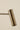 Close-up of the satin brass shade of the Heron table lamp