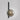 Tall Gaia wall light in bronze with a smoked glass globe, shade facing down