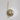 Tall Gaia wall light in satin brass with a smoked glass globe, shade facing down