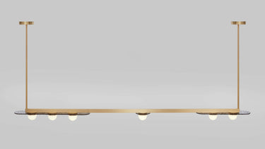 Modulo Horizontal pendant light in satin brass, studio view