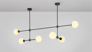 Trevi Multi 6 pendant in bronze with 6 matt opal glass globes on grid-like arms, studio view