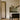 Trace Linear chandelier above a kitchen island with a marble top, seen from across the room