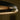 Close-up of the bronze edge and glowing alabaster of the Ceres pendant
