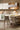 Canopy ceiling suspension light by Oluce installed in contemporary living room