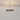 Ceres Uplighter pendant in bronze hanging from a ceiling, studio view