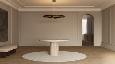 Ceres Uplighter pendant hanging over a round pedestal table in an entrance hall