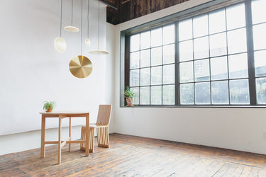 Chrona brass dish pendant cluster, second lifestyle view