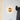 Chrona brass sconce glowing on a wall, collection lifestyle photograph