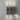 Penta Clash wall sconce, studio view of the glass and metal lamp