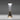 Come Together portable light by Artemide placed on modern nightstand