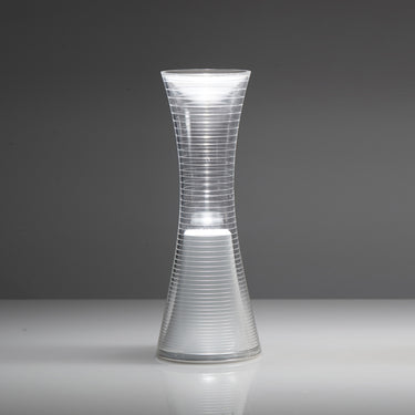 Rechargeable LED table lamp by Artemide with dimmable light for indoor and outdoor use