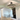 Modern wood and metal LED chandelier with matte black frame and weathered oak accents