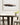 Dual ring matte black chandelier with oak wood detail for dining rooms, foyers, or offices
