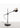 Modern adjustable desk lamp G.O. by Oluce with satin gold accents and black bas