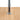Close-up of the Marcel badge on the chromed fork in solid oak