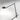 Demetra 3000K LED task lamp by Artemide featuring tiltable head, motion sensor, and clamp mount for workspace or bedroom use