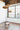 Natural Disc cluster over a loft room with a window and chair, second view, Graypants Scraplights