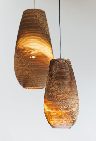 Natural Drop pendants hung together in a cluster of staggered lengths, Graypants Scraplights