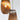 Graypants Drop pendant light with diffused warm glow for cozy interiors.