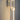 ET2 Link chain link wall sconce, Satin Nickel, lit against a dark wall