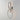 ET2 Unity wall sconce, Black Chrome, lit with glowing LED loop on a grey wall