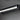ET2 Waterfall bath vanity light, Black, mounted horizontally on a dark wall