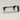 ET2 Clutch curved opal glass bath vanity light, 13 in Black, three-quarter view of the curved glass