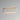 ET2 Delphi concrete panel bath vanity light, 24 in, lit with warm glow along the top and bottom edges