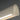 ET2 Matera 50 in Chalk White linear pendant, angled view of the arched concrete bar and light slot