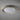 ET2 Matera 22 in Chalk White concrete flush mount, angled view of the speckled concrete ring and frosted white glass dome