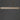 ET2 Lintel 47 in Travertine / Natural Aged Brass bar, level view with a narrow light slot underneath