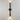 ET2 Reveal Outdoor banded tube wall sconce, 28 in Black, lit with light washing up and down the wall
