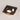 ET2 Alumilux Landscape in-ground light 2.5 x 2.25 in (E42424), Black, top view of the square hood lit