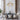Adjustable Height Gold Chandelier hanging in a Dining Room