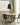 Sculptural pendant lamp, unique sand cast aluminum, office reception and dining areas.