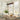 rustic 8 light wood and black metal linear chandelier hanging over long dining table