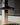 Penta Glifo wall lamp, black metal shade and stem