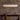 Handmade Recycled Cardboard Linear Fixture - Graypants Scraplights Disc in modern dining area