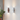 Highlighting the durable and unique steel material of the Graypants Roest wall fixture.