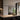 ET2 Hover single baton above a wood-top island with dark stools in a modern kitchen