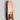 Luxurious copper Innermost Brixton wall fixture, casting indirect light in a contemporary living room space.