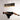 Modern linear suspension light by Tom Kirk with intricate etched facets.
