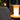 Designer bedside lamp in hand-blown amber glass and ash wood